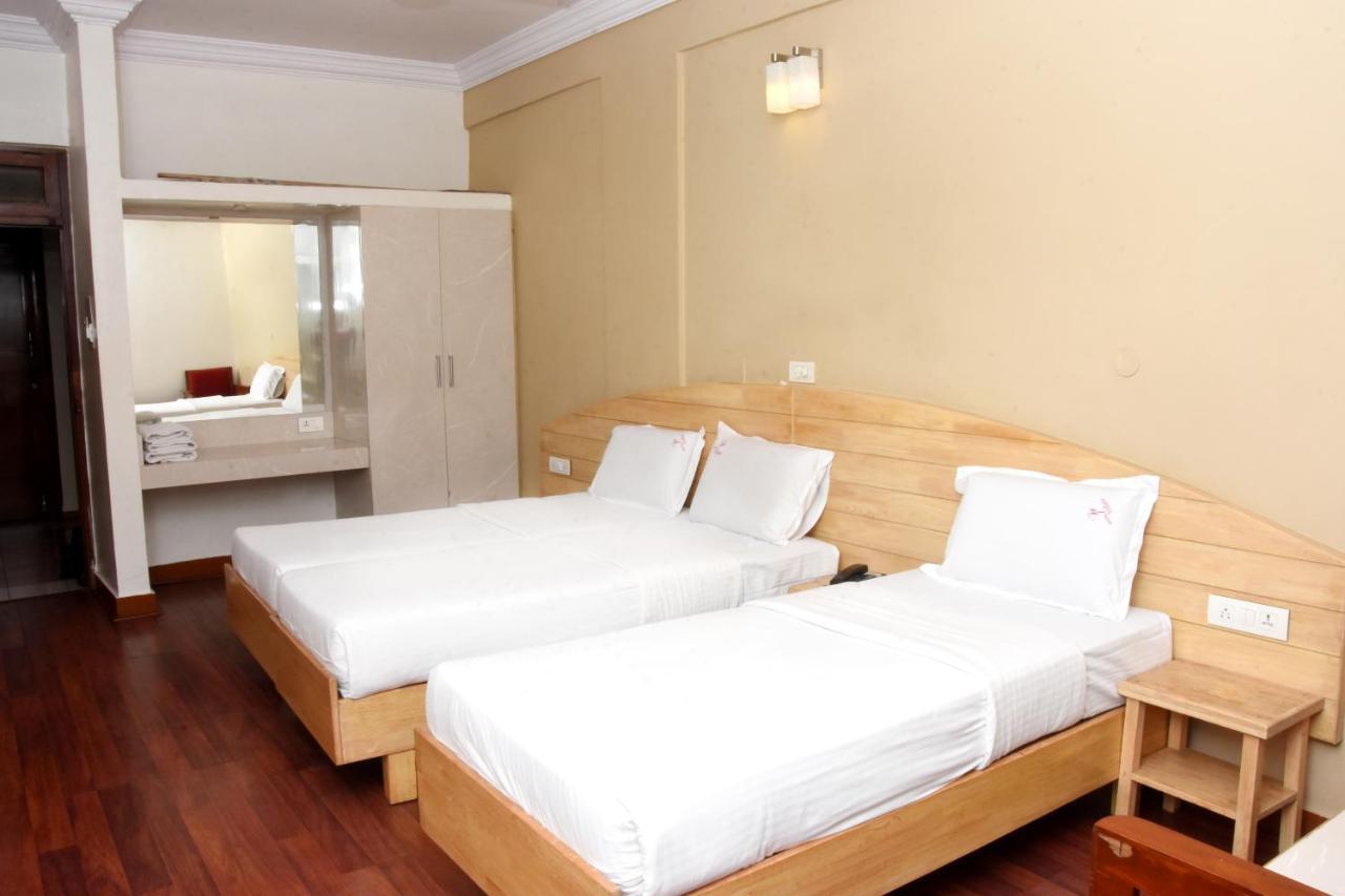 hotel vellara bangalore contact number